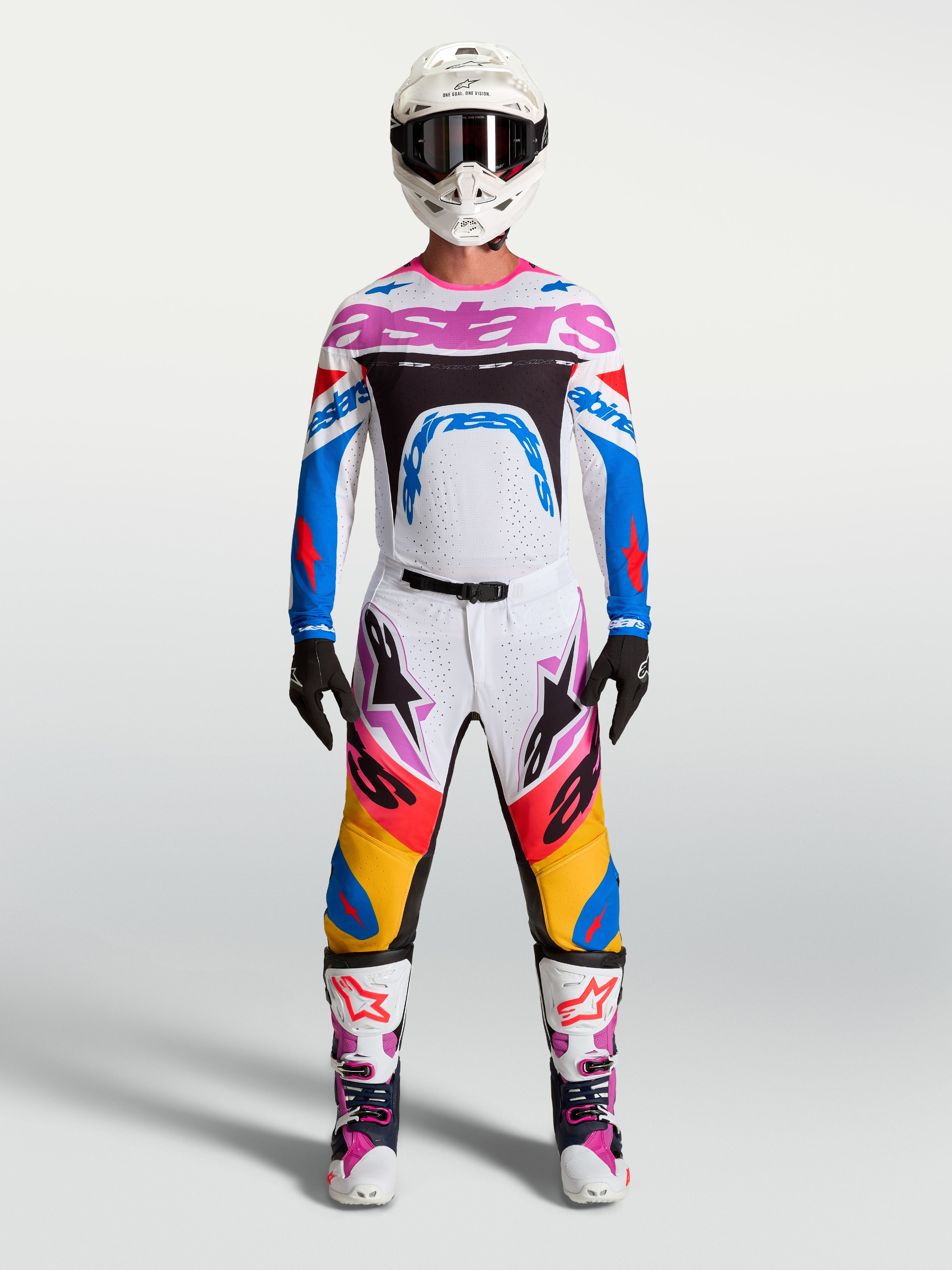 Alpinestars Supertech Dyna, conjunto de motocross para homem, branco e azul com detalhes roxos, vestuário de corrida off-road.
