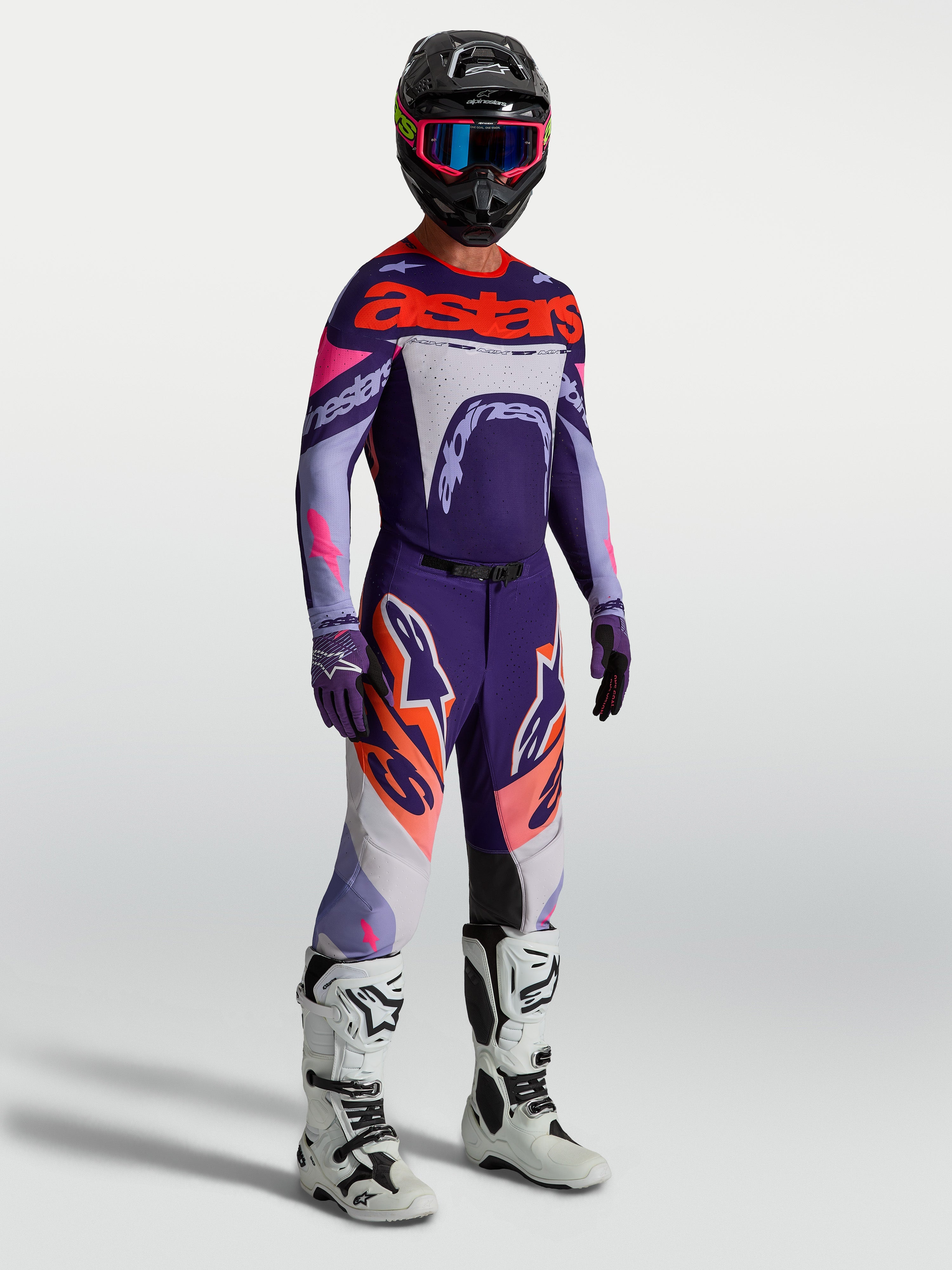 Alpinestars Supertech Dyna Gear Set, conjunto de motocross para homem, roxo e rosa fluorescente, em malha elástica leve.