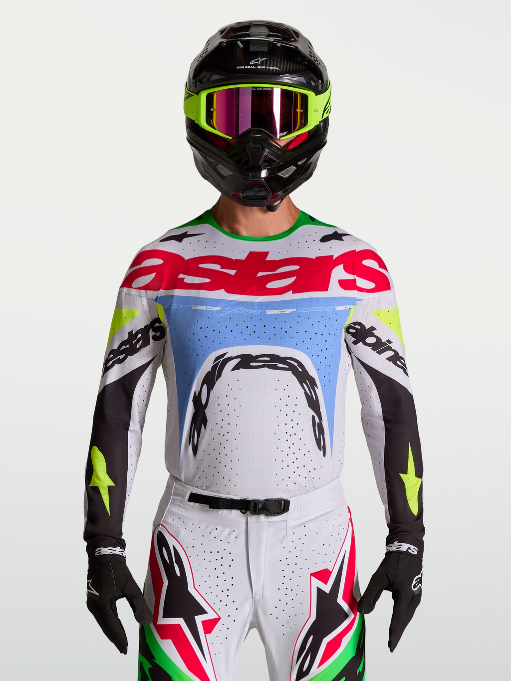 Alpinestars Supertech Dyna, camisola de motocross em lilás claro e verde fluorescente, malha elástica ventilada.