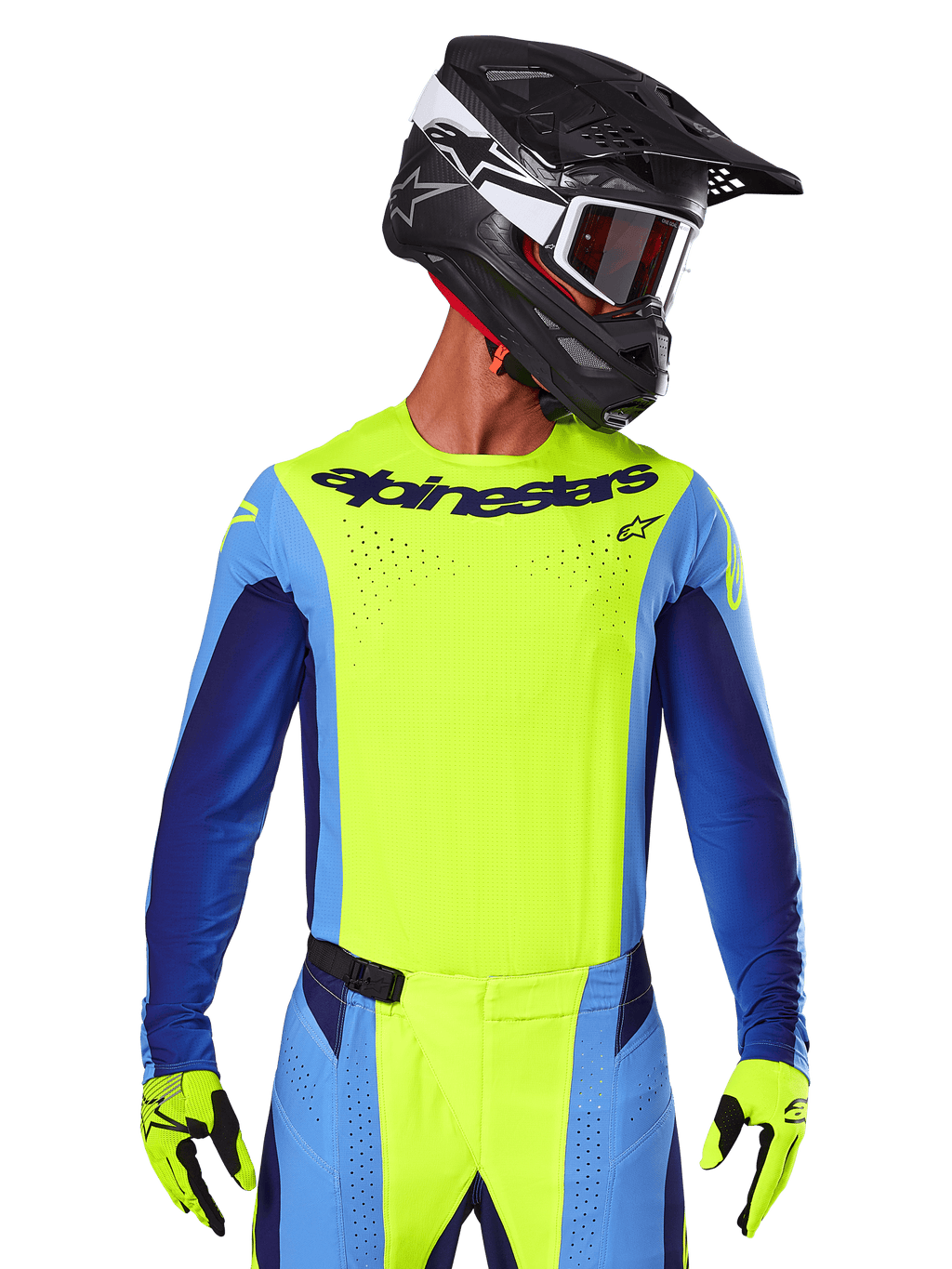 Camisola Techstar Melt 2025, camisola de motocross, amarelo fluo e azul, com ventilação cortada a laser e ajuste de corrida, usada por um piloto com capacete preto e luvas amarelo fluo