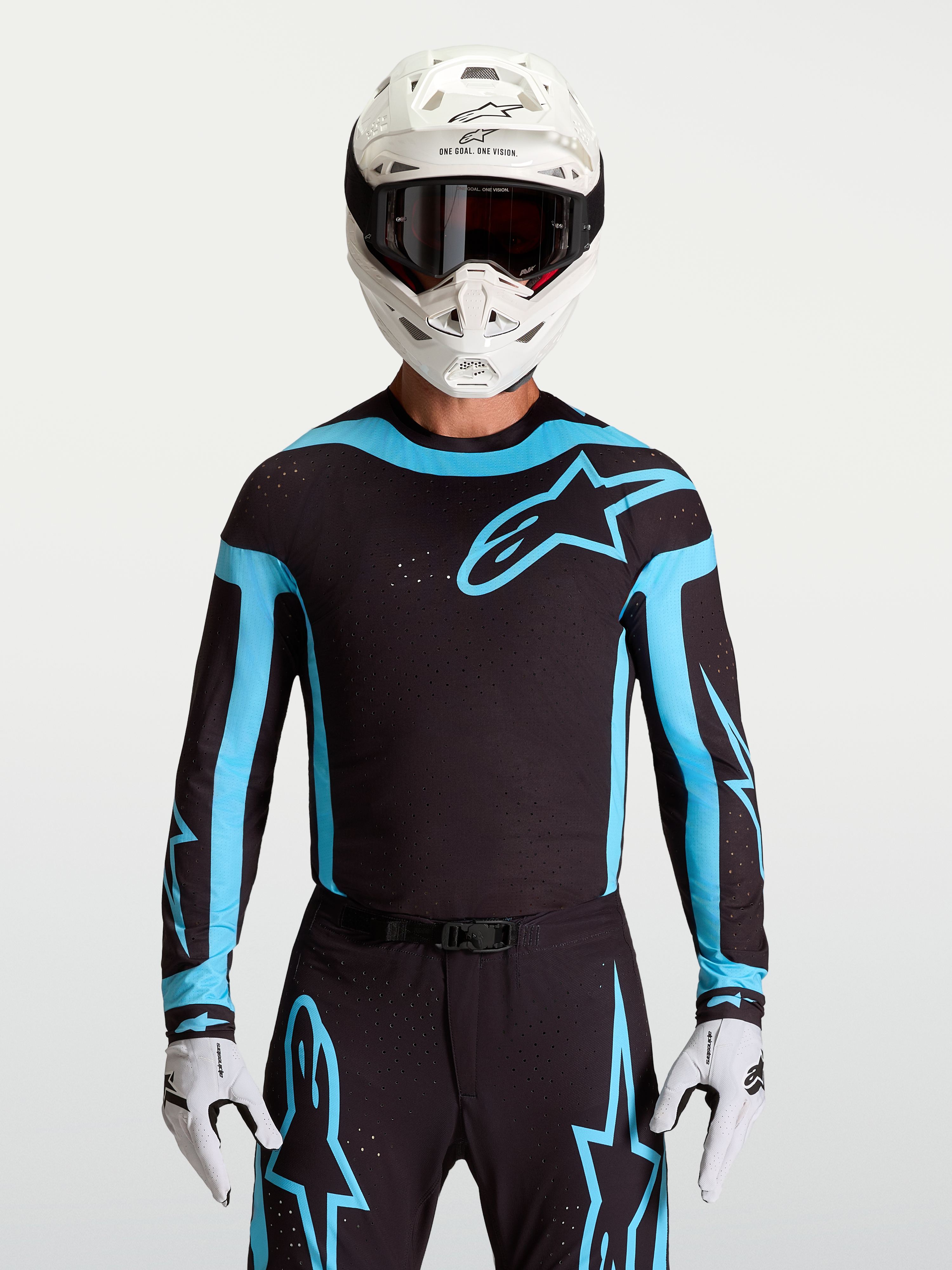 Alpinestars Supertech Vesta, camisola de motocross para homem, preta e azul-turquesa, com ventilações a laser respiráveis.