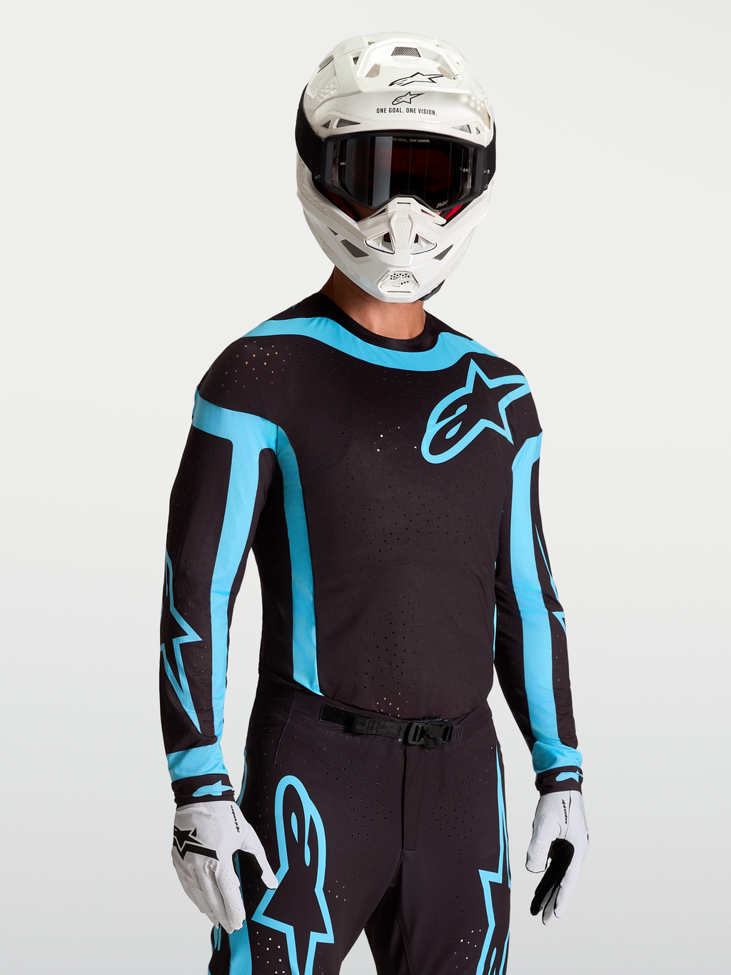 Alpinestars Supertech Vesta, camisola de motocross para homem, preta e turquesa, com ventilação a laser e ajuste atlético.