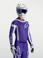 Camisola Supertech Vesta Alpinestars, camisola de motocross azul e branca, com corte atlético e perfurações a laser.