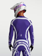 Alpinestars camisola Supertech Vesta, camisola de motocross azul escuro e branca, vista traseira com malha ventilada.