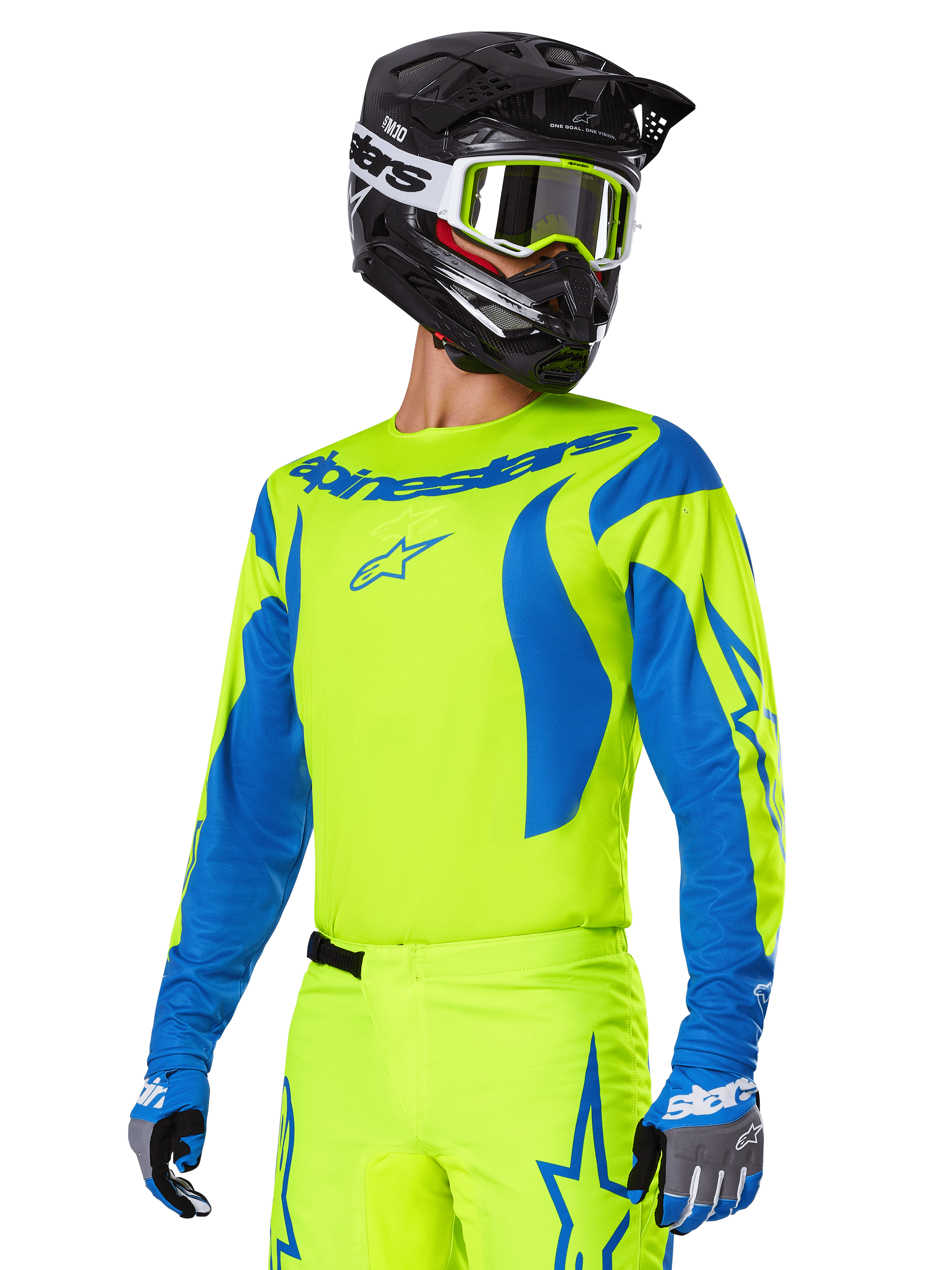 Alpinestars 2025 Fluid Haul Gear Set, Motocross Jersey and Pants, Bright Yellow and Blue, worn with a black helmet and yellow-framed goggles, features wave-like blue patterns on the sleeves and blue star logos on the pants, coordinated off-road racing outfit