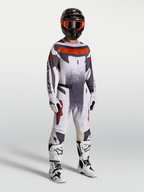Alpinestars Camisola Techstar Swan e Techstar Swan Gear Set, conjunto de motocross para homem, lilás claro e cinzento com pormenores em vermelho fluo, modelo com equipamento completo