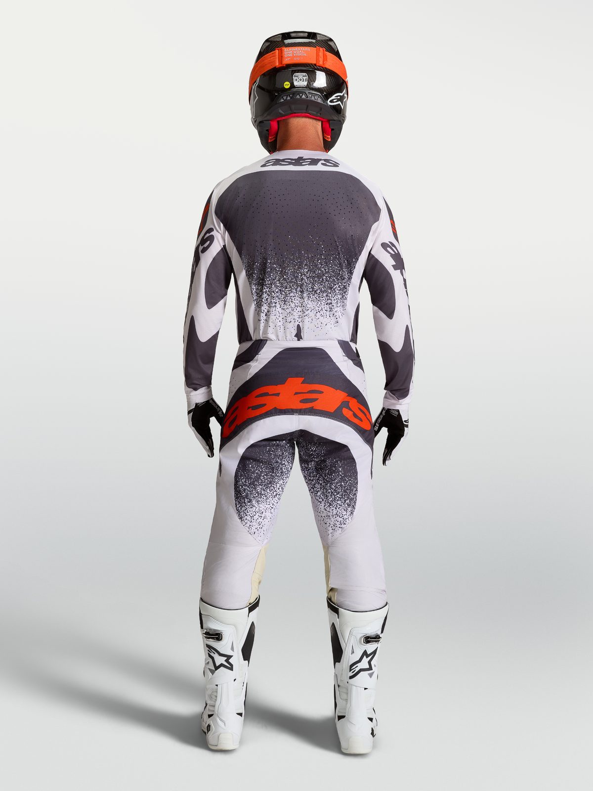 Alpinestars Techstar Swan Jersey and Gear Set, gray and white motocross gear with a red logo, rear on-model view.