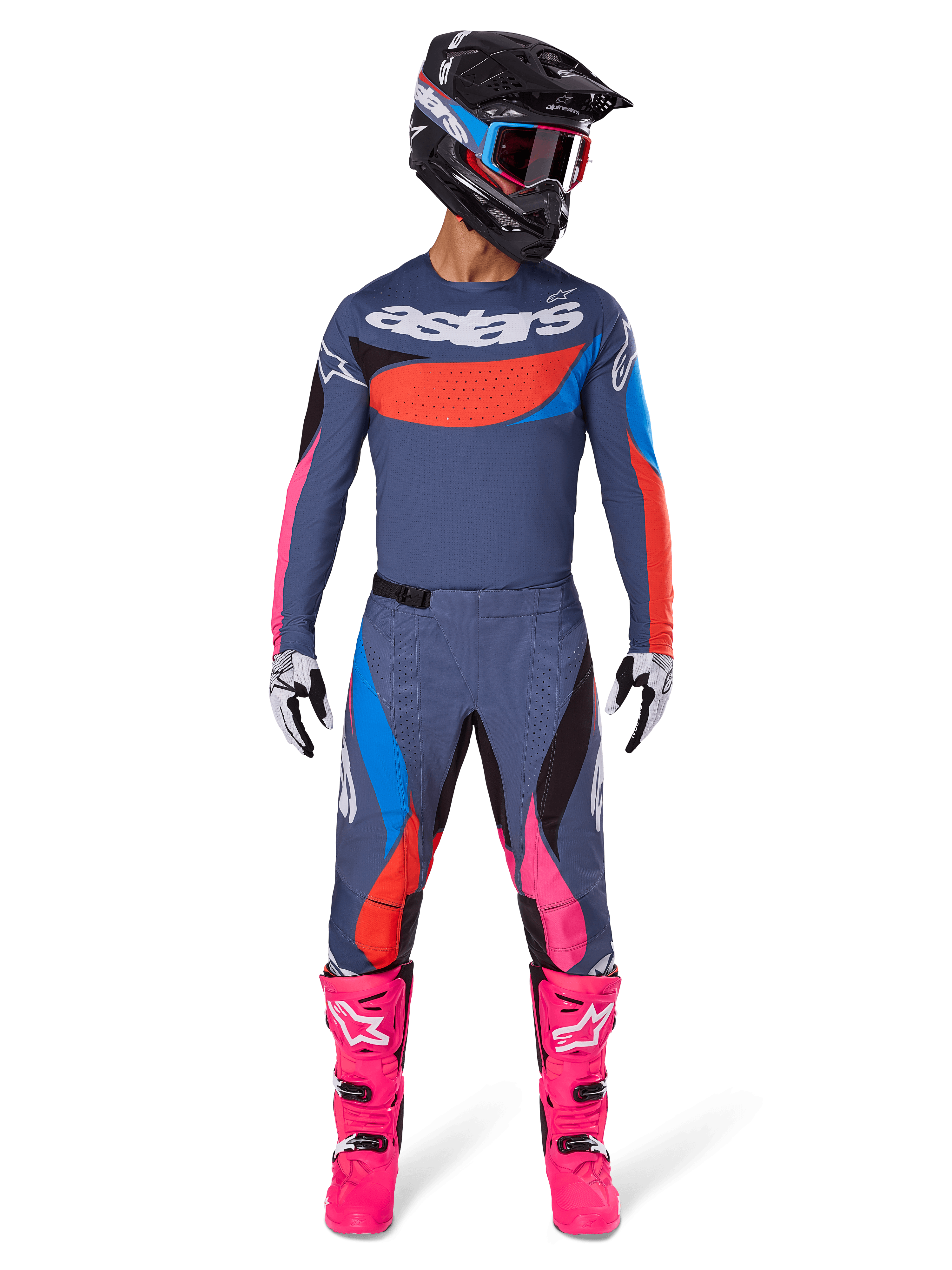 Alpinestars 2025 Techstar Dreem Gear Set, motocross rider wearing full racing gear, grayish-blue jersey and pants with vibrant pink, orange, and cyan blue accents, large 'astars' logo on chest, bright pink boots, black helmet with goggles, coordinated outfit for professional motocross