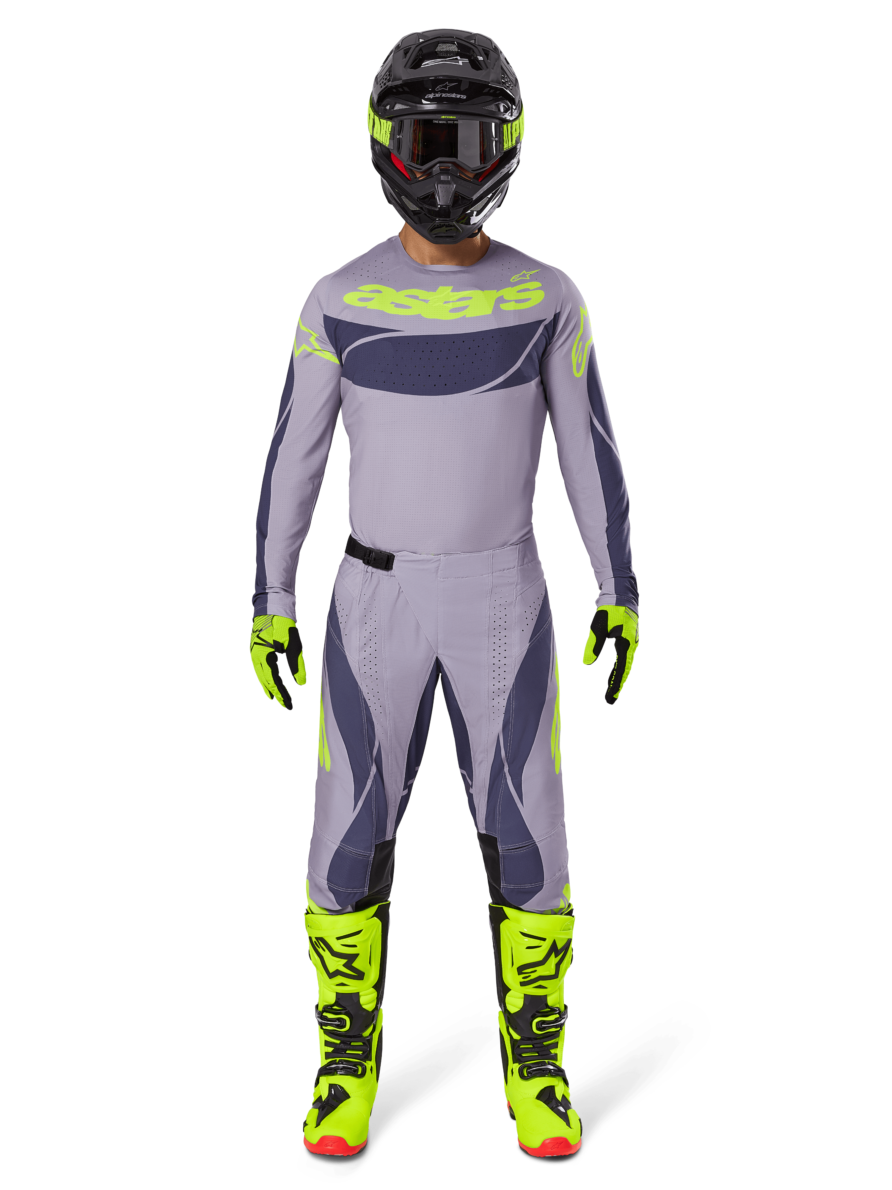 Motocross rider wearing full racing gear, 2025 Techstar Dreem Jersey in Gray and Dark Gray with neon yellow branding, matching gray and dark gray pants, neon yellow and black boots, black helmet with neon accents, coordinated outfit for professional motocross