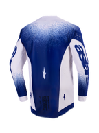 Camisola Alpinestars 2026 Supertech Scenz, vista traseira, cinzento claro e azul escuro, camisola de motocross profissional com perfurações cortadas a laser nos painéis laterais, painel central azul escuro com o texto 'Race Spec' na parte inferior, corte atlético de corrida