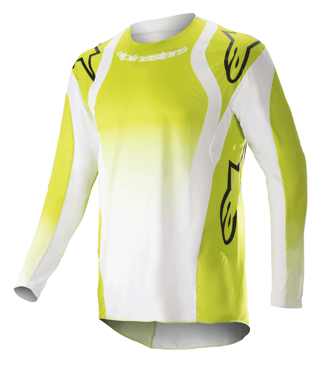 Camisola Alpinestars 2023 Techstar Push, camisola de motocross de manga comprida, amarelo fluorescente e branco, com grandes logótipos Astars pretos nos ombros e mangas, tecido perfurado de alto desempenho, gola redonda e bainha traseira alongada para corridas de todo-o-terreno