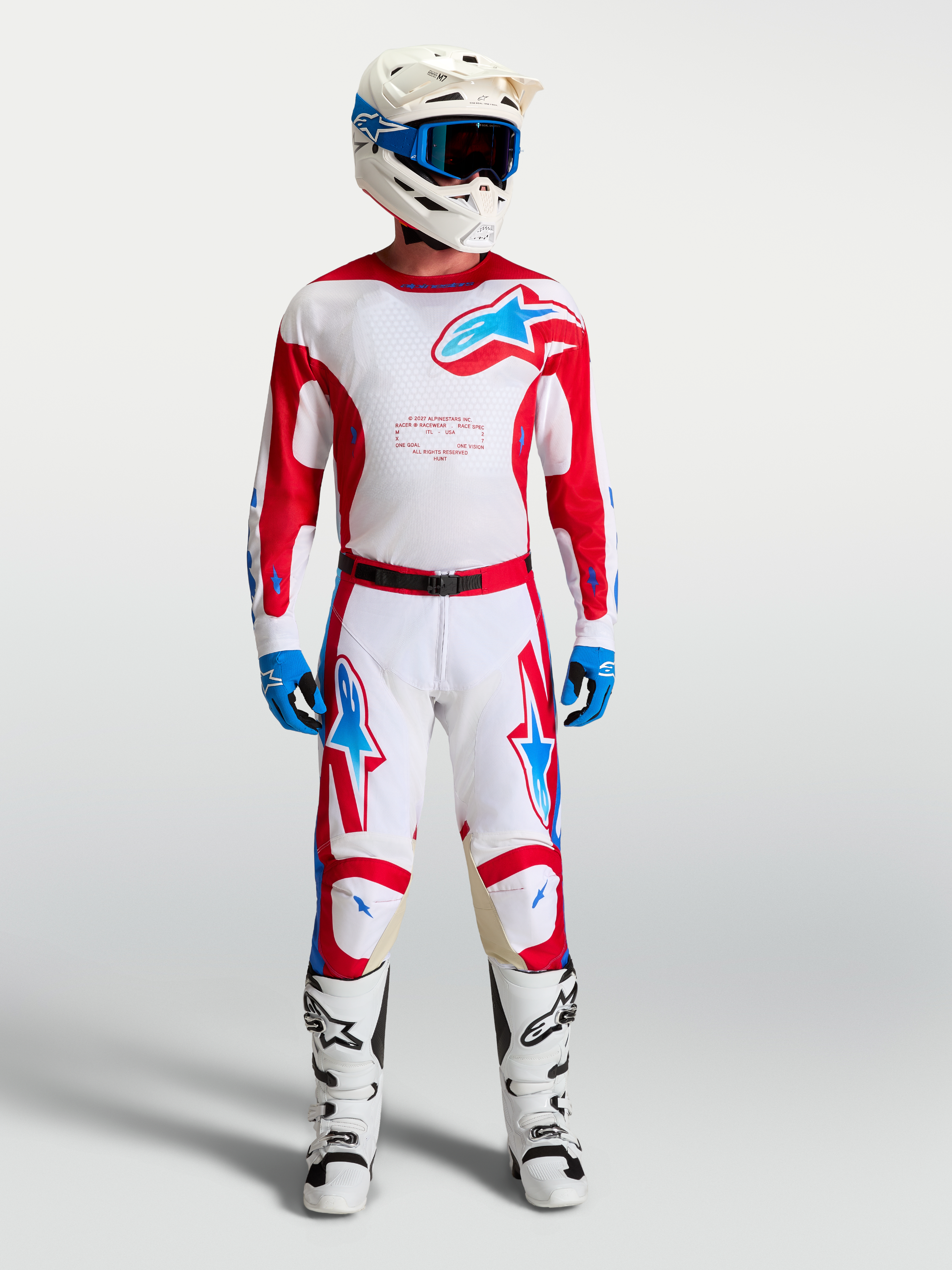 Alpinestars Calças Racer Hunt, calças de motocross para homem, brancas e vermelhas com azul, ajuste ergonómico pré-curvado.
