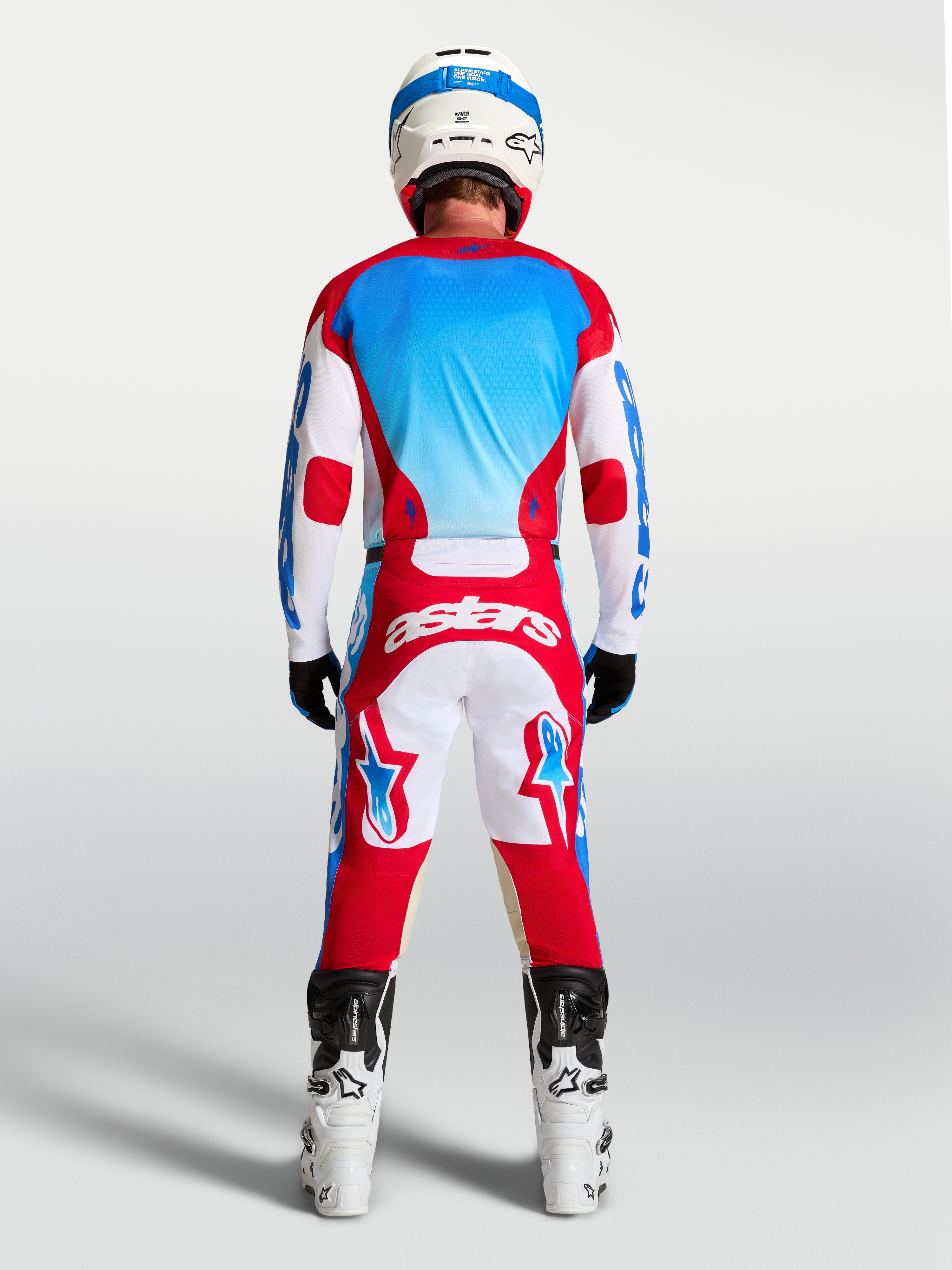 Alpinestars camisola Racer Hunt para homem, vermelha, branca e azul, motocross, vista traseira, com absorção de humidade.