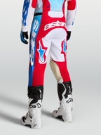 Alpinestars Calças Racer Hunt, calças de motocross para homem, vermelhas e brancas, pormenores em couro e gráficos de estrela, corte ergonómico desportivo para off-road.