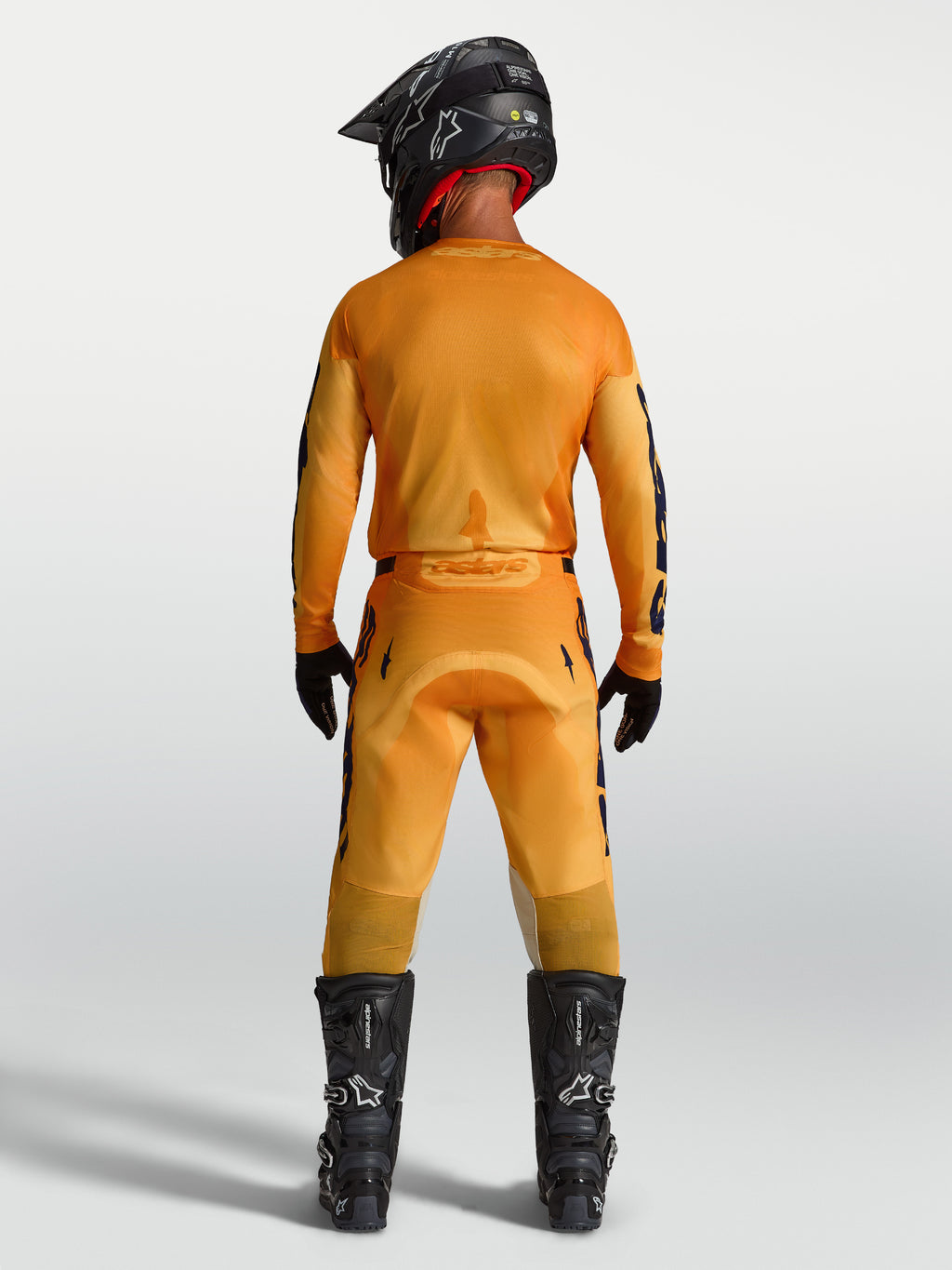 Alpinestars Racer Amber, camisola e conjunto de motocross para homem, laranja e azul escuro, vista traseira integral.