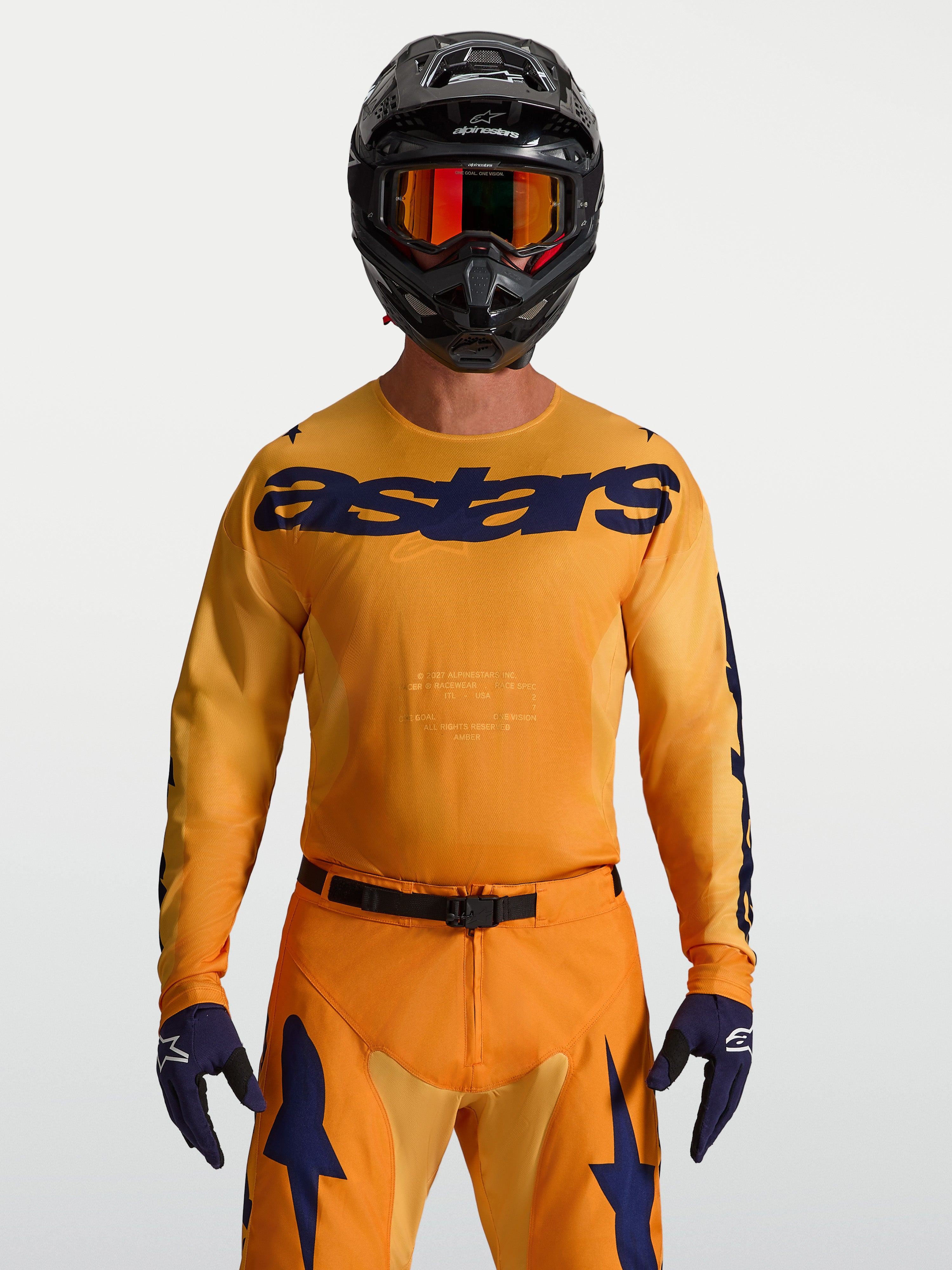 Camisola Racer Amber da Alpinestars, camisola de motocross para homem, laranja e azul escuro, em politecido respirável.