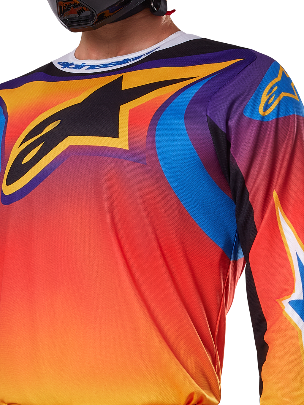 Alpinestars 2025 Fluid Wurx Jersey, design multicolorido em branco e laranja, camisola de motocross de manga comprida, ajuste atlético descontraído, tecido polifabric que absorve a humidade para desempenho em todo-o-terreno