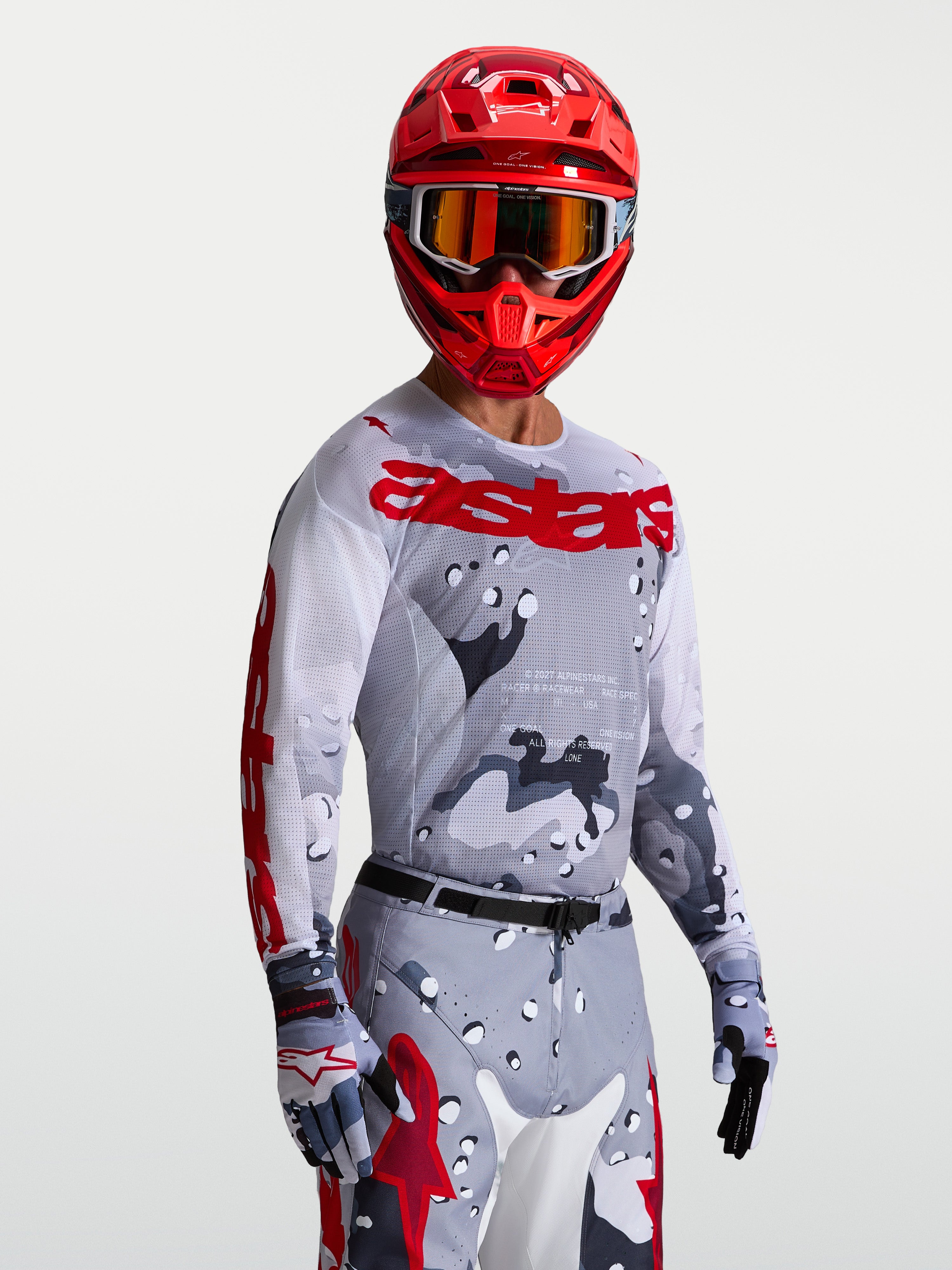 Alpinestars Racer Air Lone, camisola de motocross para homem, cinzenta camuflada e vermelha, malha respirável de alto desempenho.