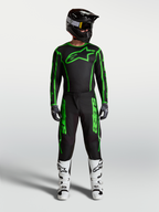 Alpinestars Fluid Apex V2, camisola e conjunto de motocross para homem, preto e verde fluo, com calças e botas brancas.