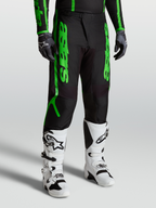 Alpinestars Calças Fluid Apex V2, equipamento de motocross para homem, pretas e verde fluorescente, construção em polifabric 600D reforçado, design ergonómico para performance off-road