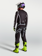 Alpinestars Camisola Fluid Apex V2, camisola de motocross para homem, preta e prateada, vista traseira com ajuste desportivo.