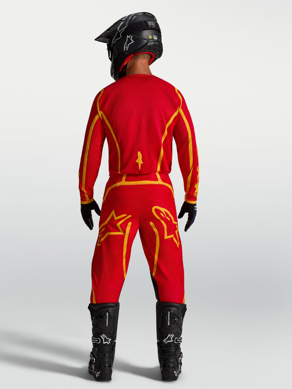 Camisola Alpinestars Fluid Apex V2 de motocross, homem, vermelha e dourada, vista traseira, material respirável.