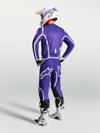 Alpinestars camisola Fluid Apex V2, equipamento de motocross para homem, azul e branca, vista traseira com ajuste atlético.
