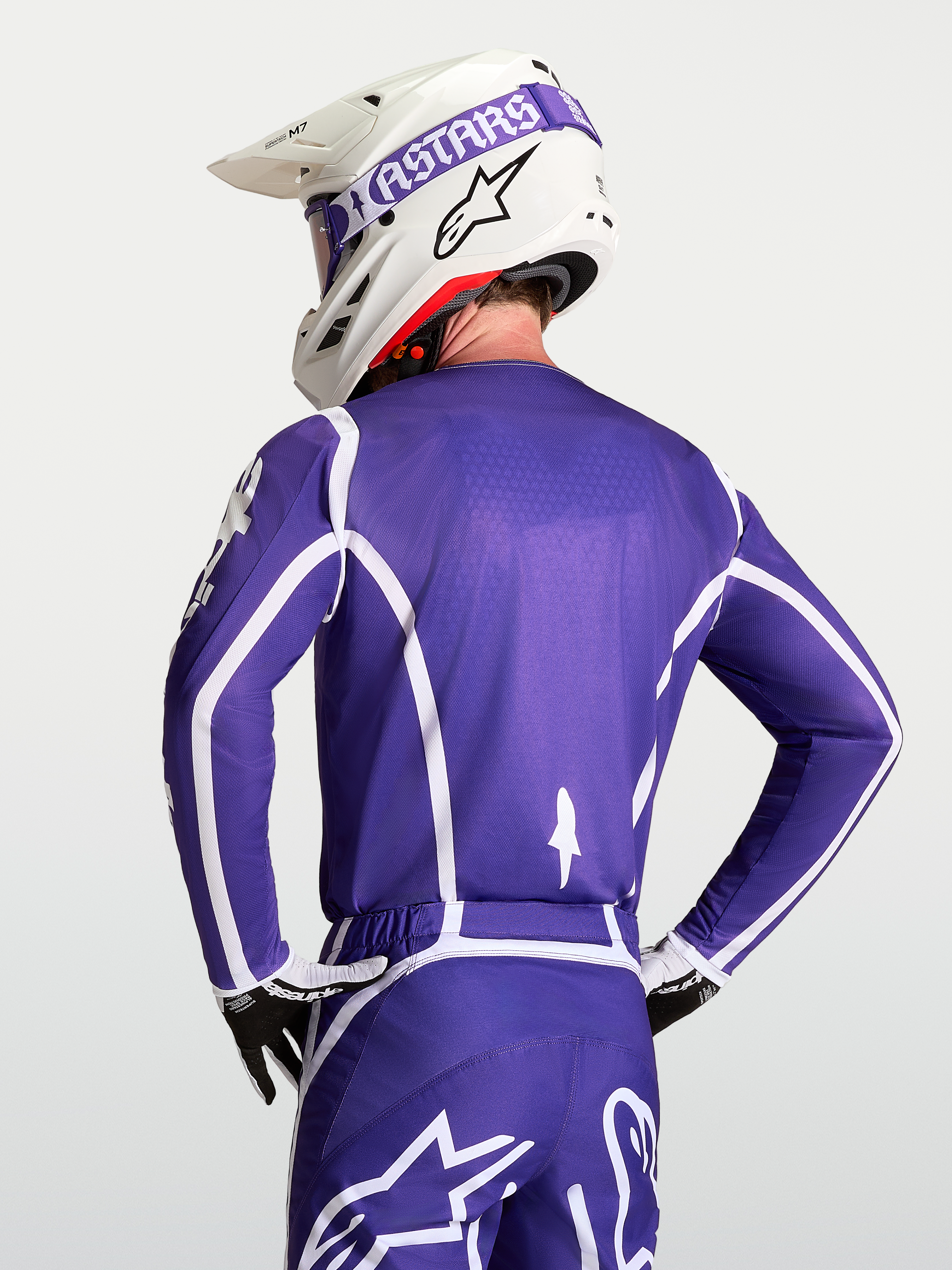 Alpinestars Camisola Fluid Apex V2, camisola de motocross para homem, azul e branca, vista traseira, construção em polifabric respirável