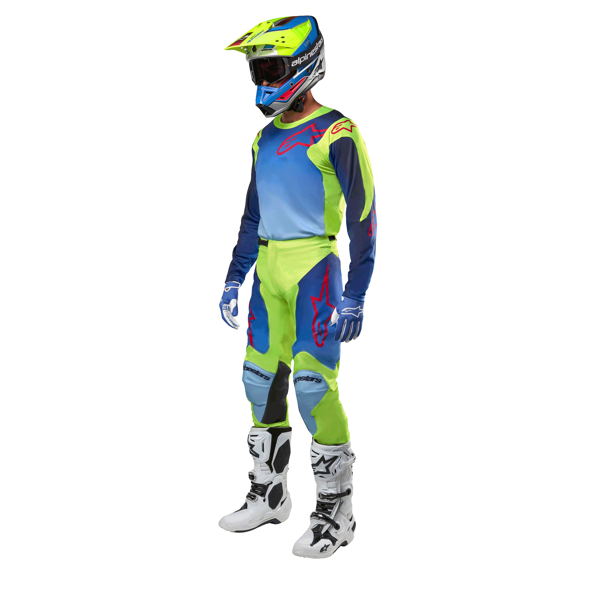Alpinestars 2024 Racer Hoen Jersey, Motocross Jersey, Yellow Fluo and Blue Night Navy, worn by a rider with matching pants, helmet, and white boots, professional racing gear for off-road riding