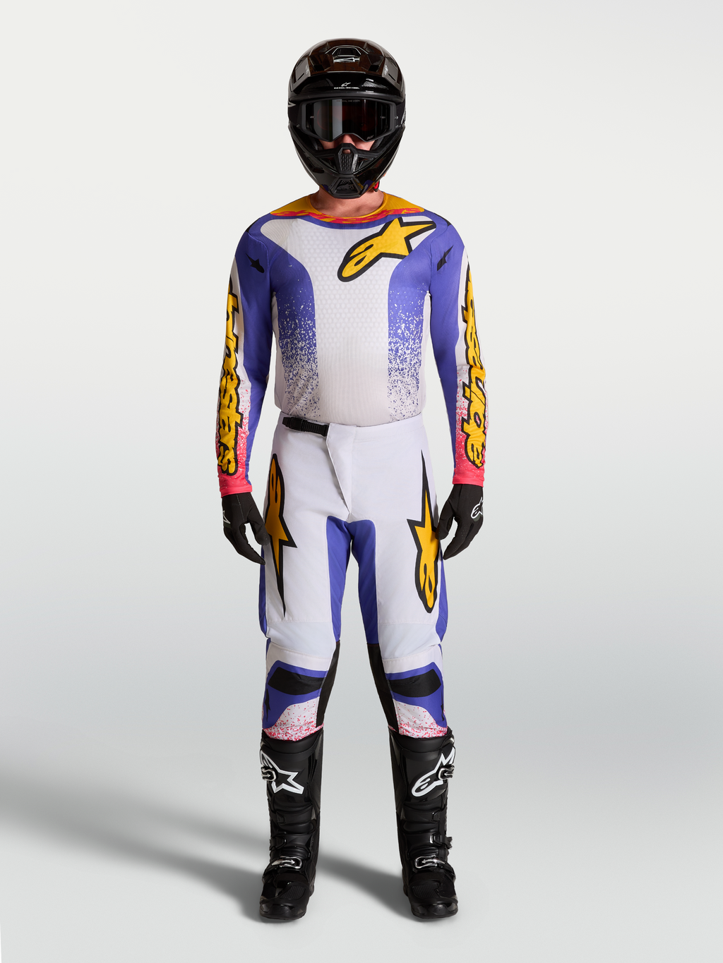 Alpinestars Fluid Drag, conjunto de motocross para homem, lilás, azul e dourado, camisola e calças para todo-o-terreno.