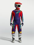 Alpinestars Fluid Drag Jersey AND Fluid Drag Gear Set, navy blue and fire red motocross outfit with white boots and helmet.