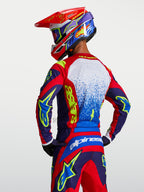 Alpinestars Camisola Fluid Drag, camisola de motocross para homem, azul e vermelha, material leve e respirável, vista traseira.