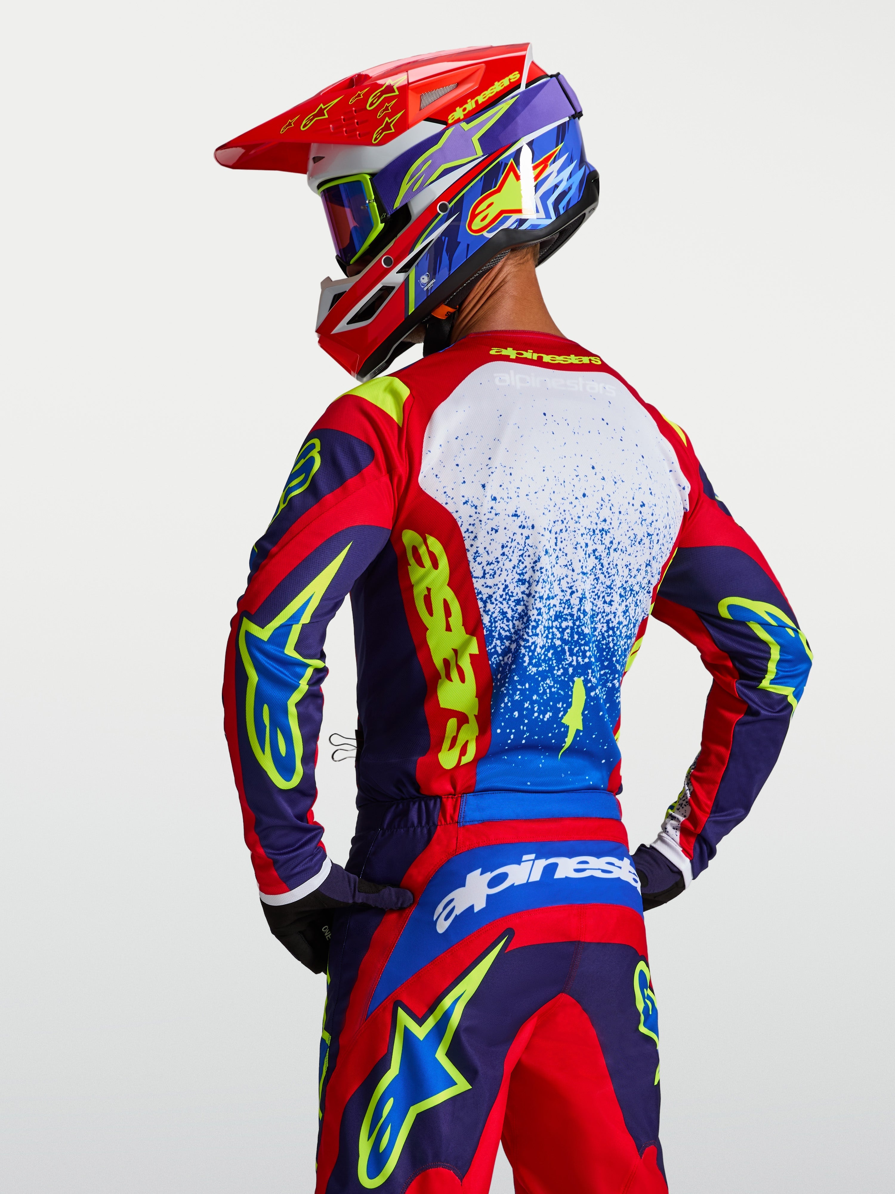 Alpinestars Camisola Fluid Drag, camisola de motocross para homem, azul e vermelha, material leve e respirável, vista traseira.