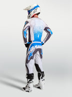 Alpinestars Fluid Drag Gear Set, conjunto de equipamento MX para homem em cinzento e azul, vista traseira de performance.