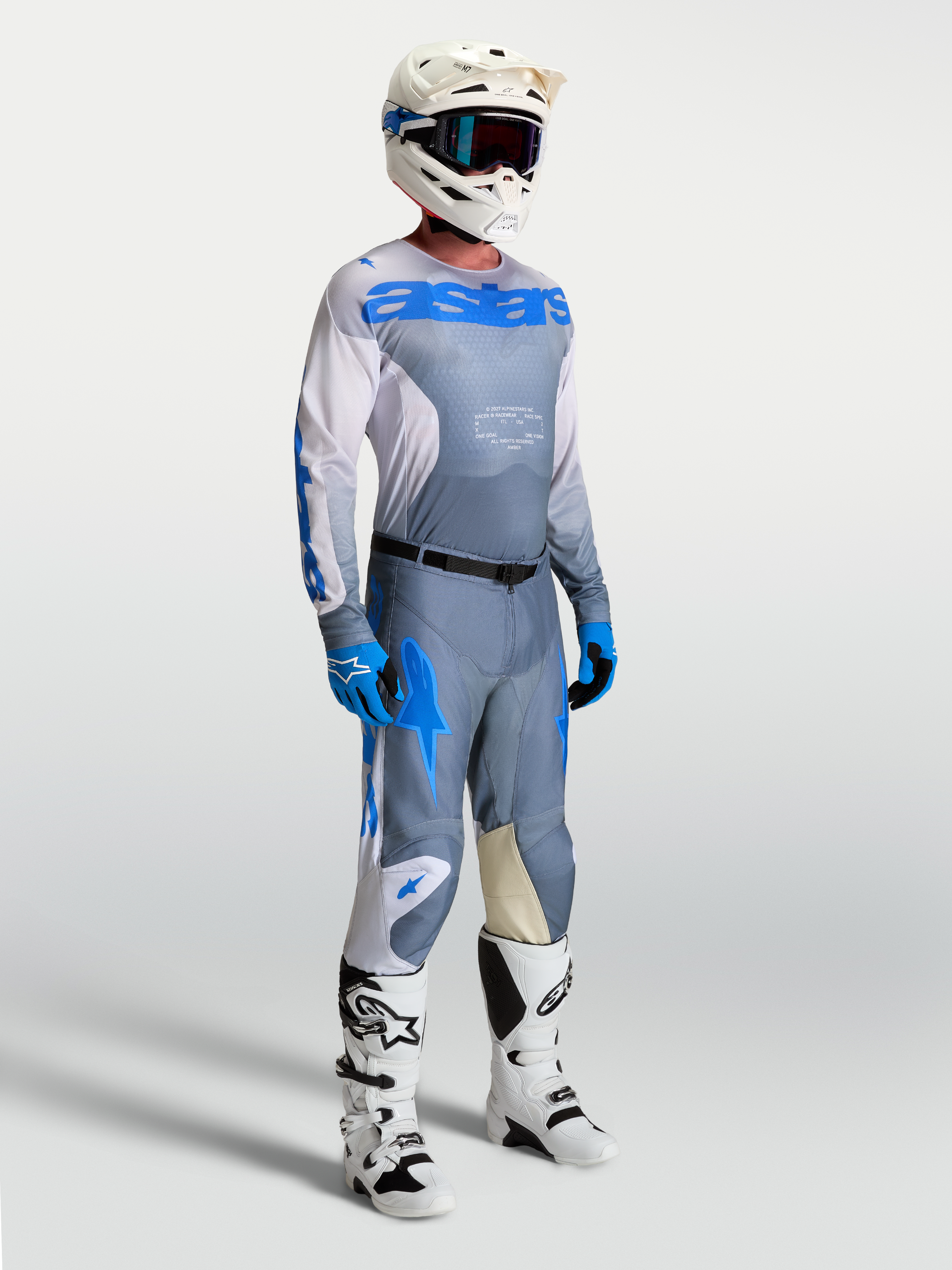 Alpinestars Racer Amber Gear Set e calças Racer Amber, equipamento de motocross para homem, cinzento e azul.