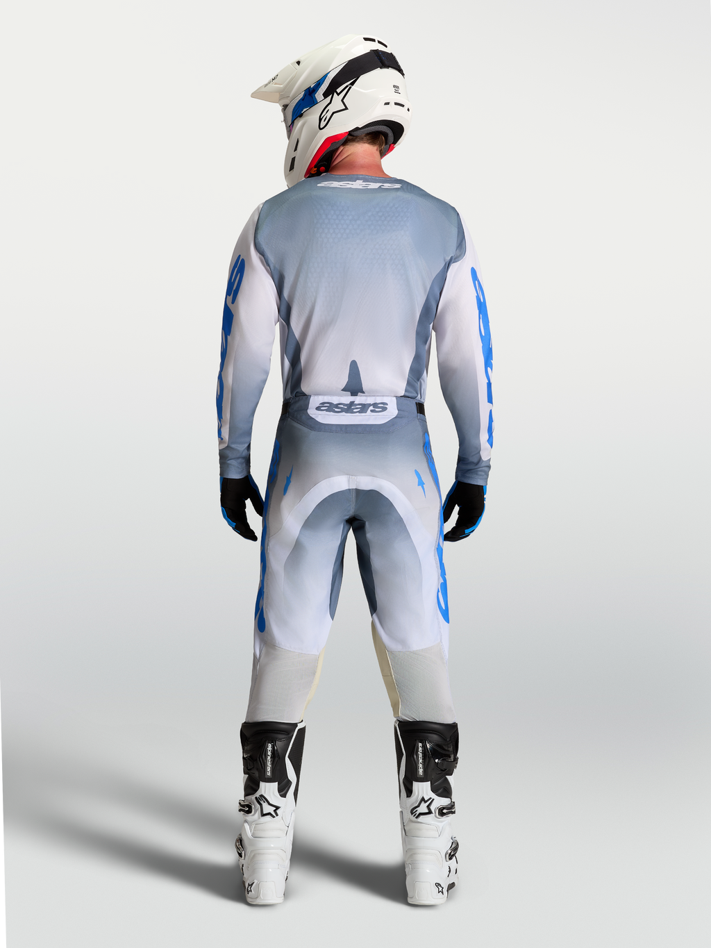 Alpinestars Camisola Racer Amber, camisola de motocross para homem, em cinzento e azul, vista traseira integral no modelo.