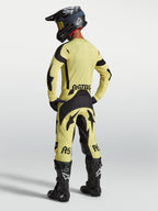Camisola Techstar Atrox Alpinestars, camisola de motocross para homem amarela e preta com perfurações a laser, vista traseira