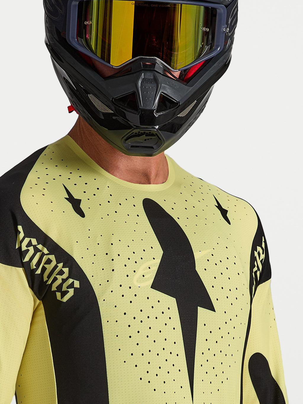 Alpinestars Techstar Atrox, camisola de motocross amarela e preta com ventilação perfurada a laser e ajuste atlético.