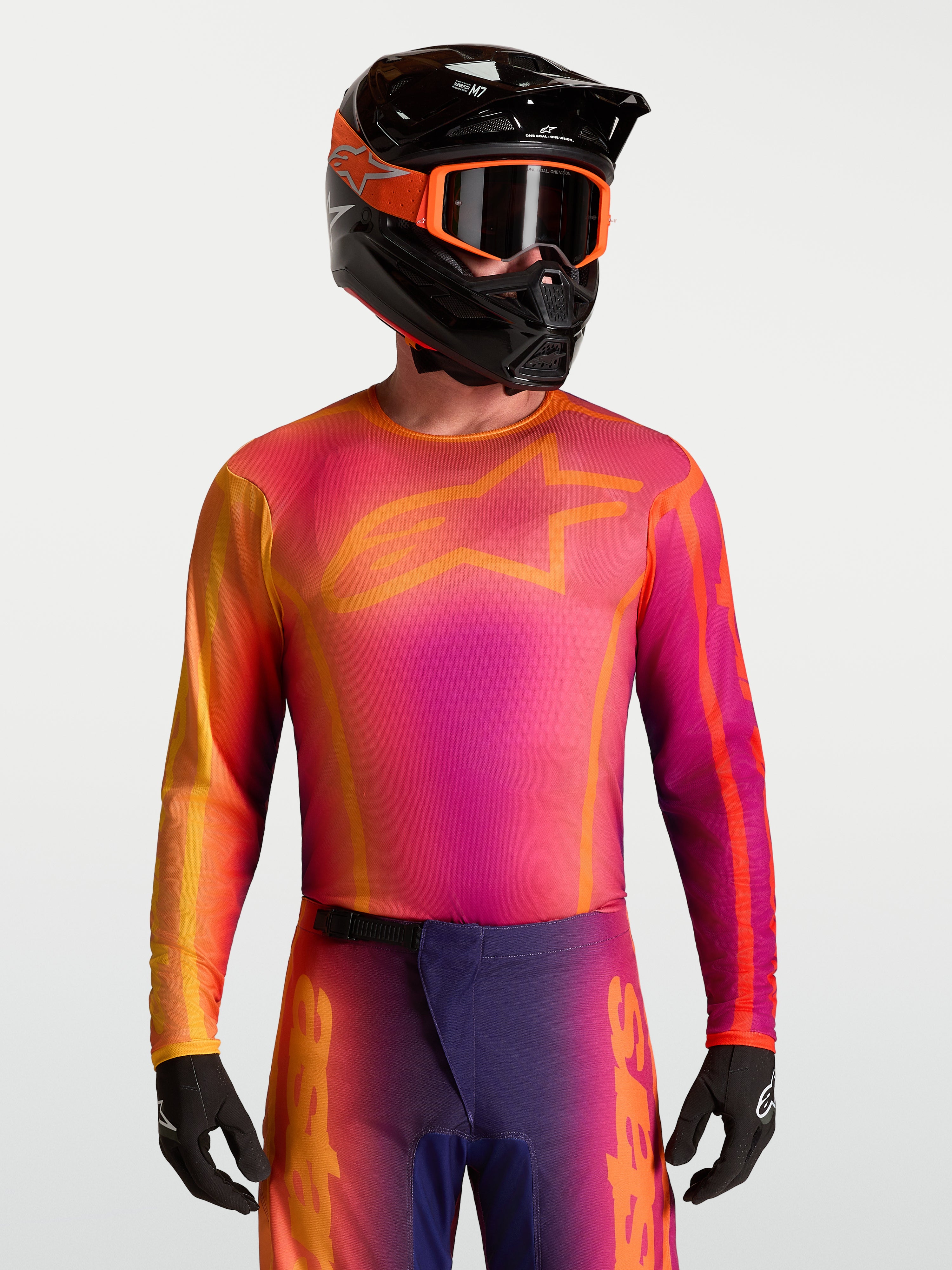 Alpinestars Fluid Kepler Jersey, purple and orange motocross top with moisture-wicking fabric and athletic fit.