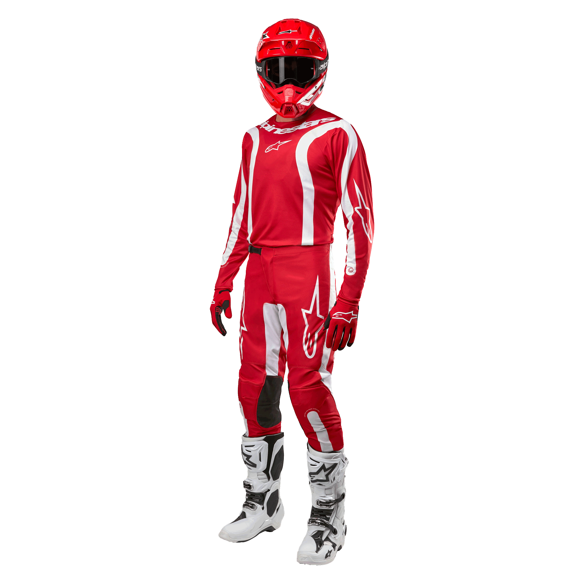 Piloto de motocross com equipamento completo, camisola Alpinestars 2024 Fluid Lurv em Vermelho Mars e Branco, calças vermelhas com detalhes brancos a condizer, capacete vermelho, luvas vermelhas e botas brancas e pretas, conjunto coordenado para corridas de todo-o-terreno