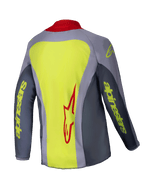 Alpinestars 2025 Youth Racer Melt Jersey, camisola de motocross, vermelho vivo e cinzento com detalhes em amarelo néon, vista traseira com um grande painel amarelo néon e logótipo Alpinestars em vermelho, mangas cinzentas com marca em texto amarelo e gola vermelha, vestuário técnico leve para corridas de todo-o-terreno