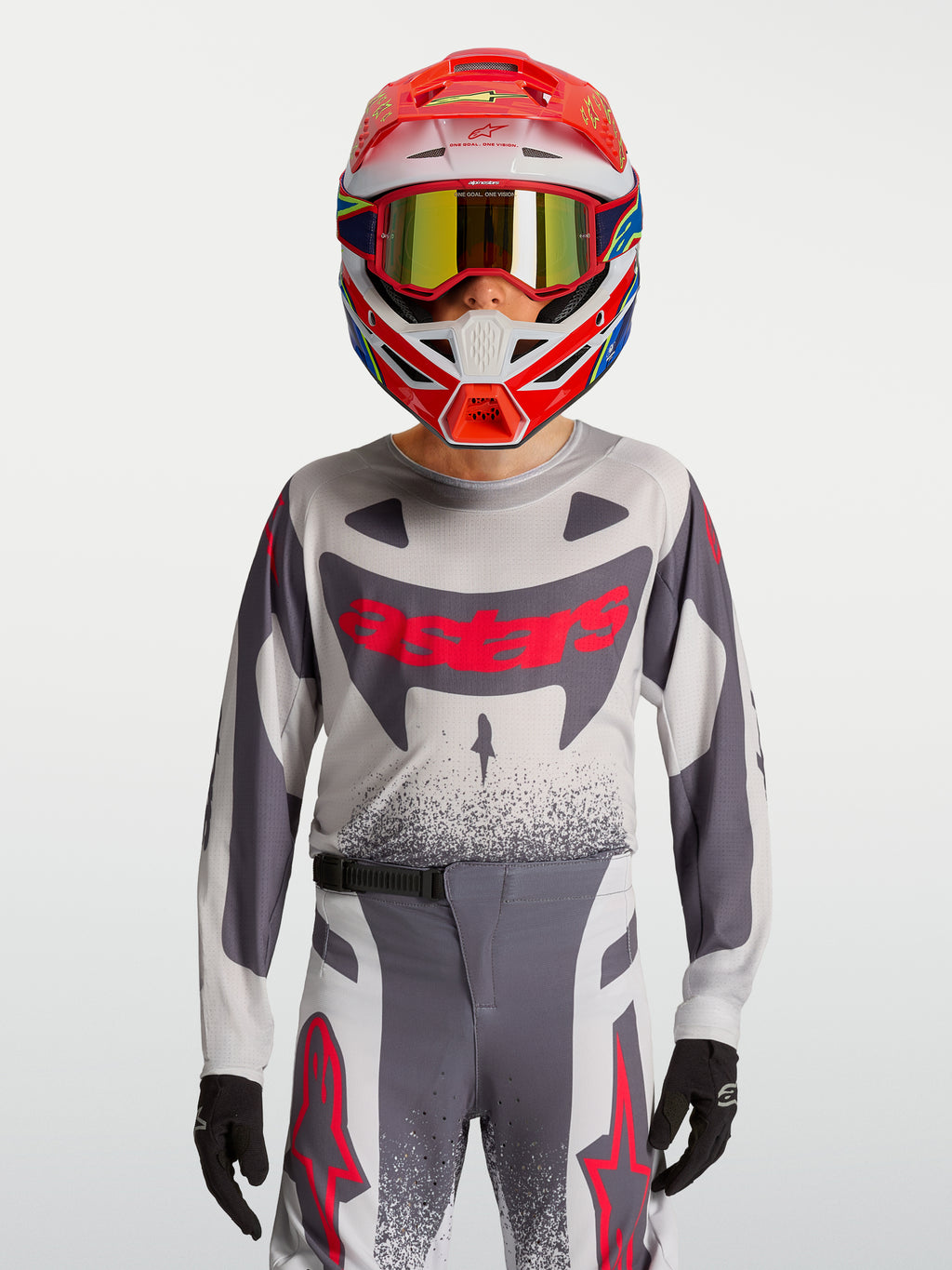 Alpinestars Youth Supertech Swan Jersey and Gear Set, conjunto de motocross em malha elástica, cinzento e vermelho fluo.