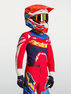 Camisola Alpinestars Supertech Dyna Jovem, equipamento de motocross vermelho e azul, malha leve de alto desempenho.