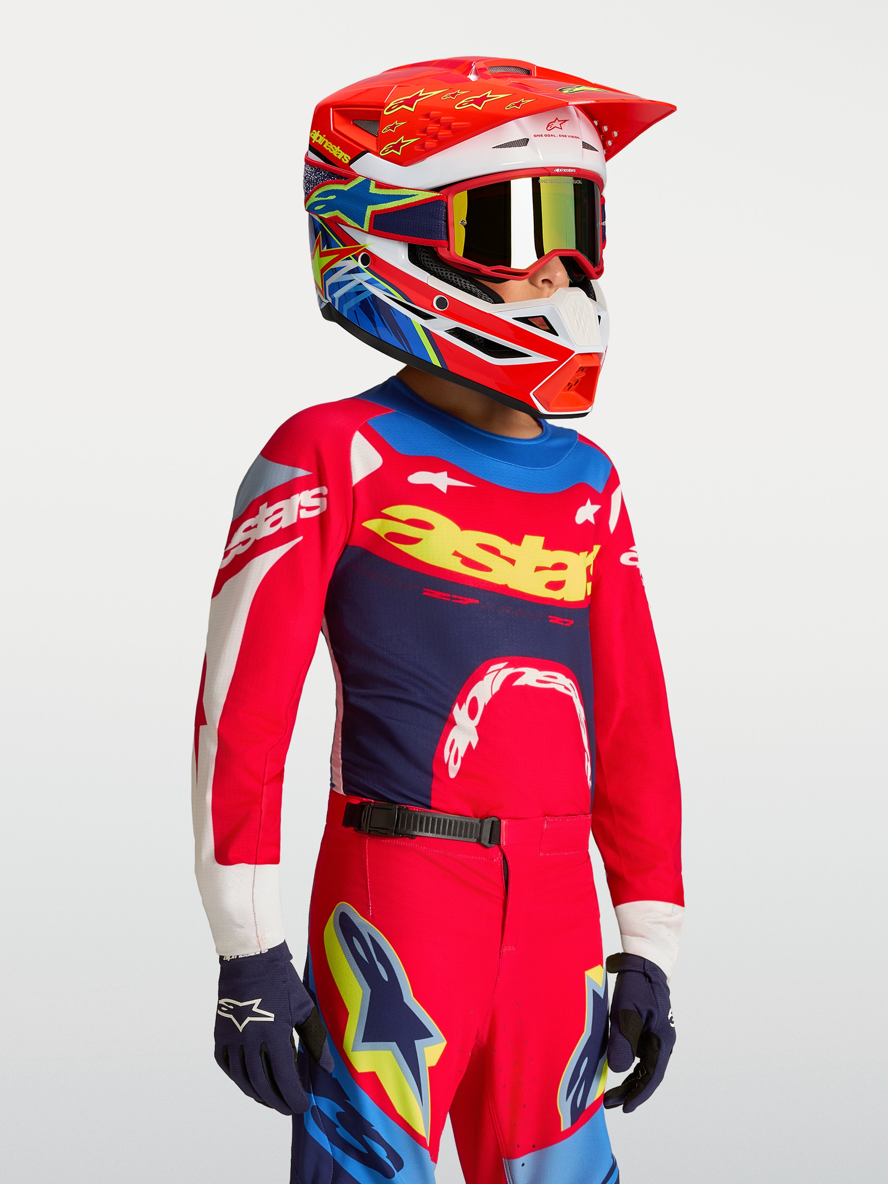 Camisola Alpinestars Supertech Dyna Jovem, equipamento de motocross vermelho e azul, malha leve de alto desempenho.