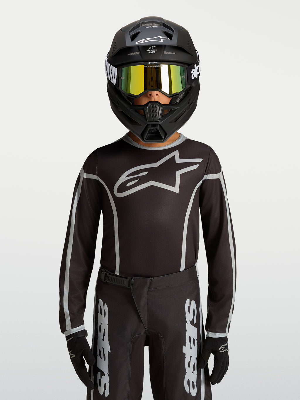 Alpinestars camisola Fluid Apex V2 jovem, equipamento de motocross preto e prateado, ajuste atlético ergonómico em polifabric com absorção de humidade