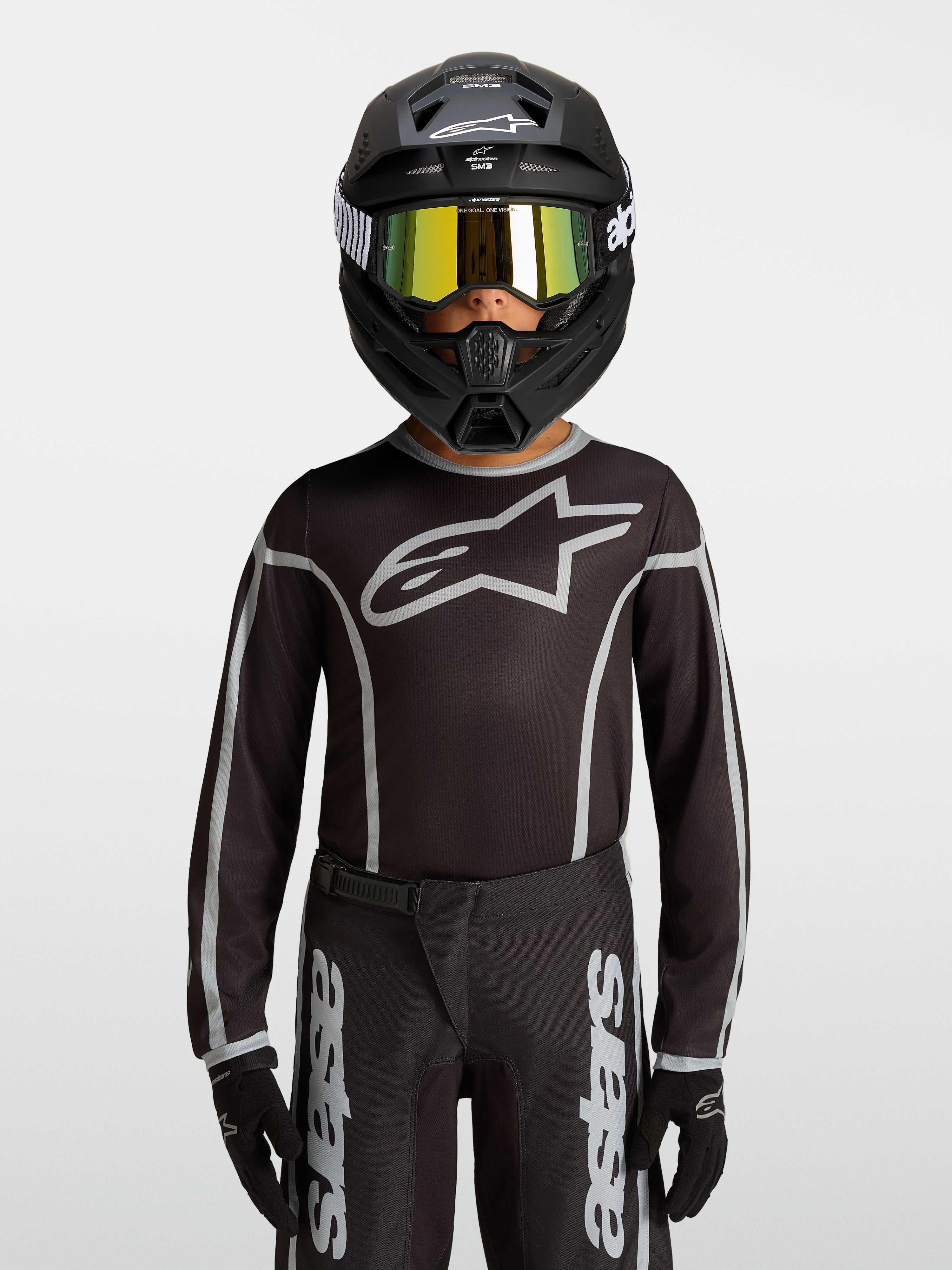 Alpinestars camisola Fluid Apex V2 jovem, equipamento de motocross preto e prateado, ajuste atlético ergonómico em polifabric com absorção de humidade