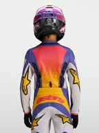 Alpinestars Camisola Fluid Drag Juventude 2027, camisola de motocross azul e amarela, vista traseira, gráficos de corrida.