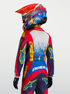 Alpinestars Fluid Drag, camisola de motocross para jovens, vermelha e azul-marinho com grafismos amarelos, vista traseira.