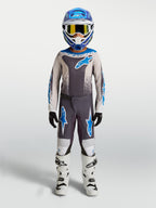 Alpinestars Juventude Fluid Drag Gear Set, conjunto de motocross cinzento e azul para performance todo-o-terreno.