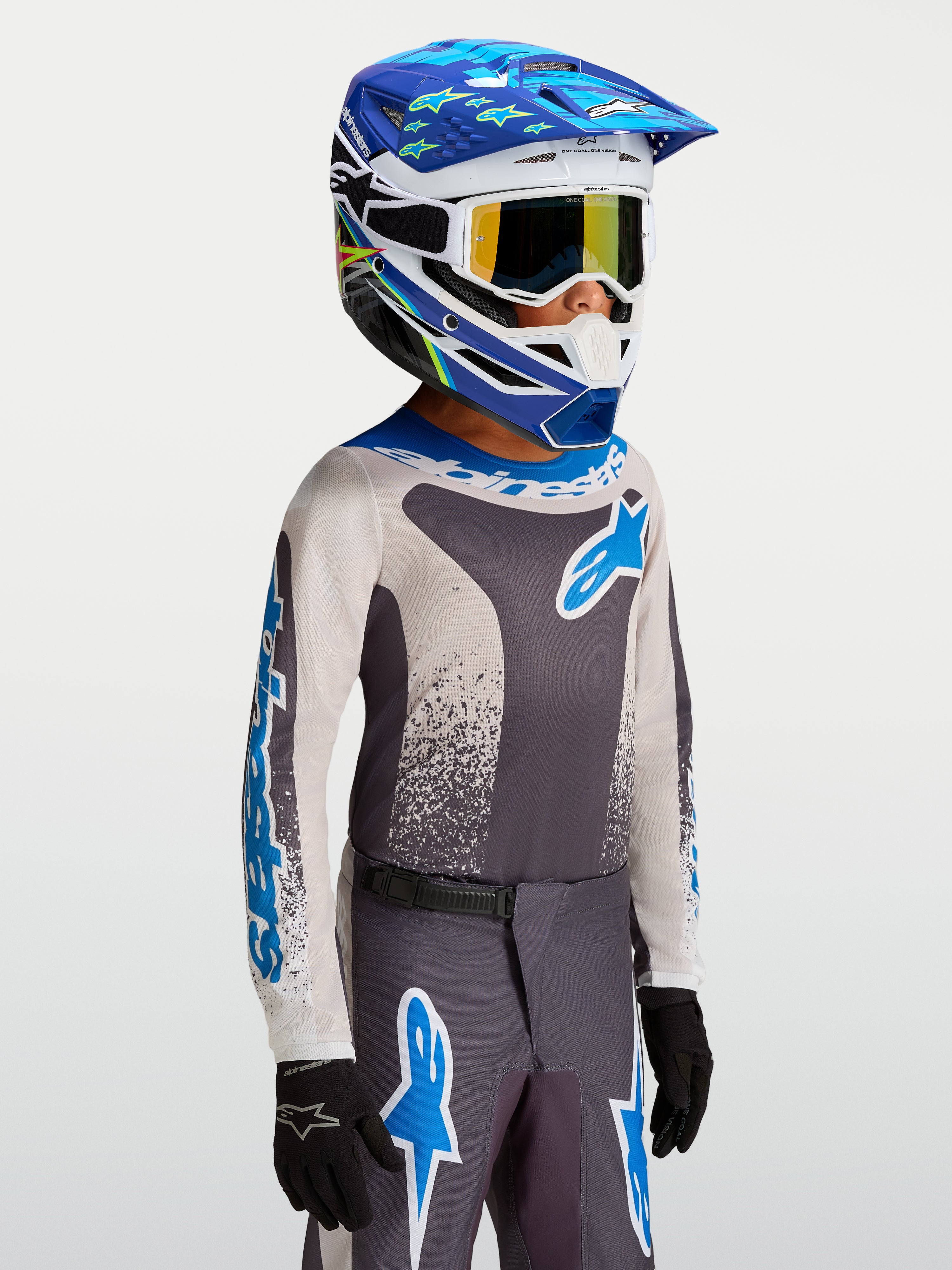 Alpinestars Camisola Fluid Drag Jovem, camisola de motocross para juventude, cinzento e azul, tecido técnico de performance.